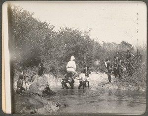 view Crossing a stream.