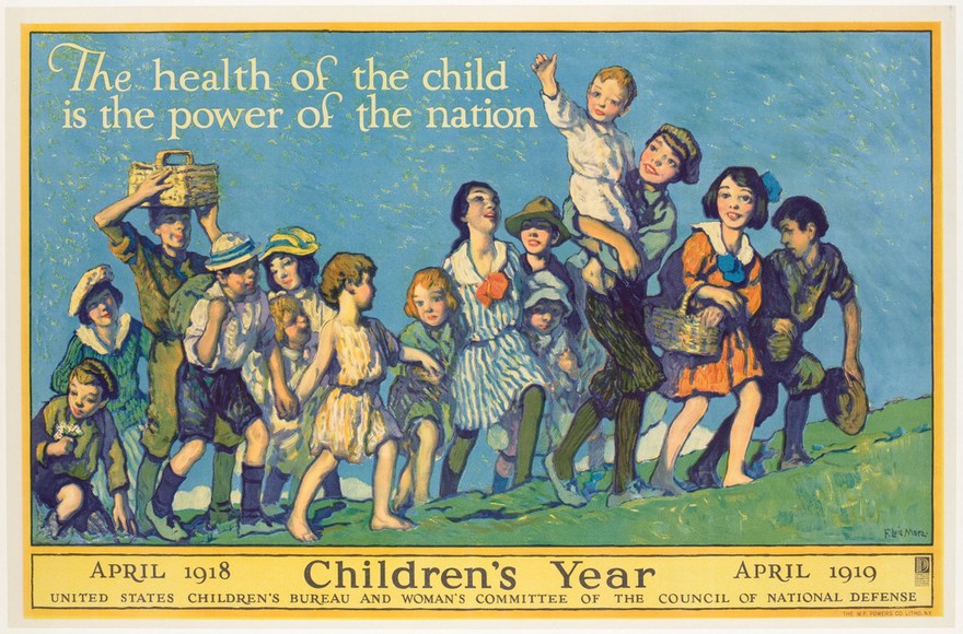 Children walking up a grassy knoll in the open air, taking healthy exercise. Colour lithograph after F. L. Mora. 1918.