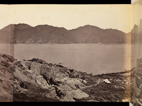 Kowloon, Hong Kong: military encampments on land and fleets in the bay during the Second China War: panoramic view. Photograph by F. Beato, ca. 1860.