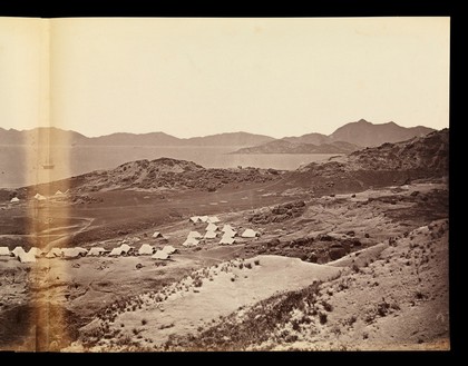 Kowloon, Hong Kong: military encampments on land and fleets in the bay during the Second China War: panoramic view. Photograph by F. Beato, ca. 1860.