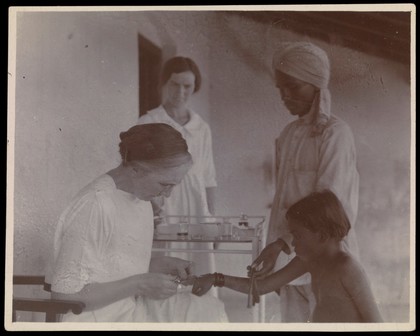 Dichpali, Hyderabad: Dr Isabel Kerr vaccinating a child in the leprosy hospital. Photograph by G.M. Kerr, 1926.