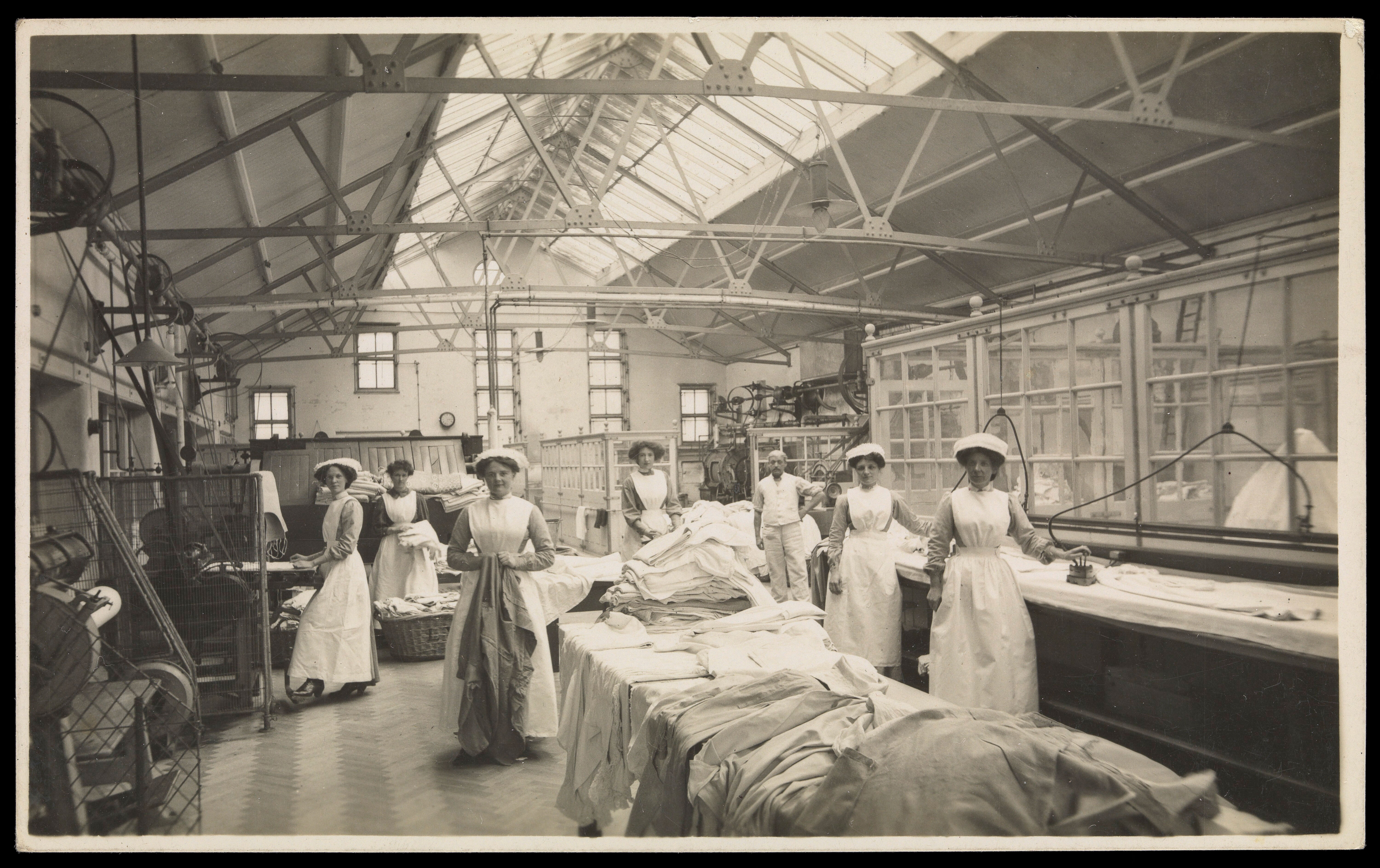 Nurses in the laundry of a hospital. Photograph, 191.