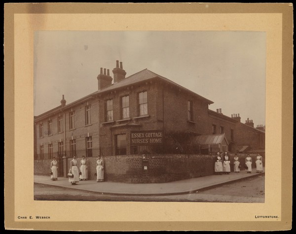 Queen's District Training Home, Essex County Training Home, Leytonstone: nurses standing outside the home. Photograph by Chas. E. Webber, ca. 1900 (?).