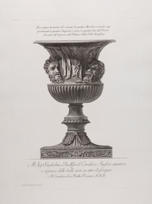A marble vase. Etching by G.B. Piranesi. A vase with carved masks representing according to Piranesi either the four seasons or the four ages of man.