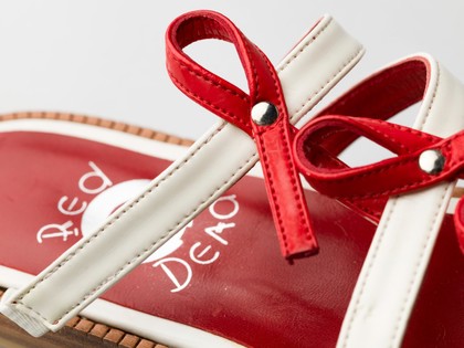 Red and white sandals - HIV / AIDS awareness.