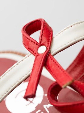 Red and white sandals - HIV / AIDS awareness.