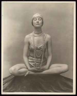 view Marguerite Agniel seated in a Buddha position, circa 1929.