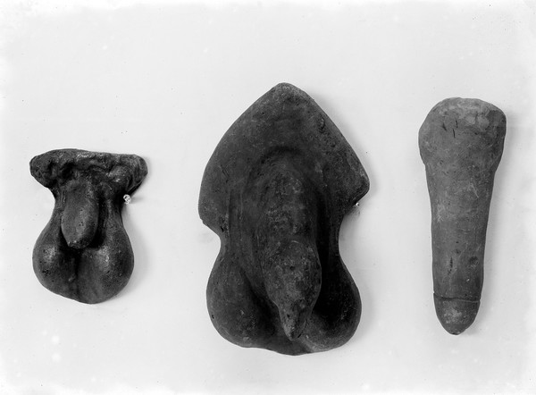 Three Roman votive offerings: penis.