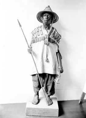 A model of an African Medicine man in full costume