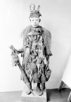 A model of an African Medicine man in full costume