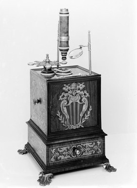 Microscope belonging to Pope Benedict XIV with ornamental inlay in base.
