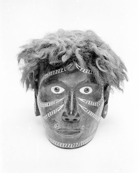 Carved head inlaid with zig-zag design, Solomon Islands
