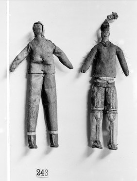 Two models in native dress, made by native Greenlanders.