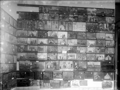 Wax votes: wall covered with ex-voto pictures. In the Musee Etnographique, Palmero.