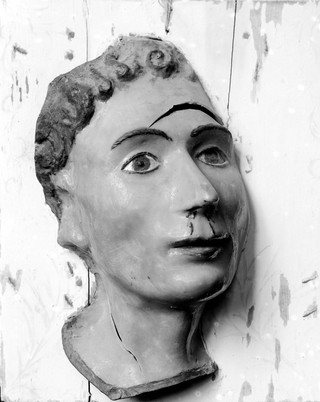 Wax ex-voto of head. Gash in forehead and blood from nose. Musee Etnographique, Palermo.