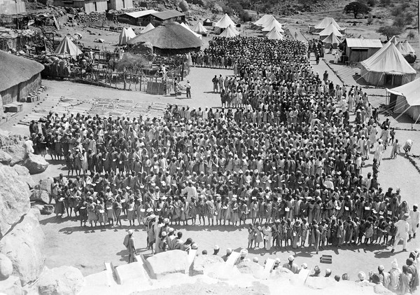 Jebel Moya: view of natives and tents, taken from the roof of House of Boulders