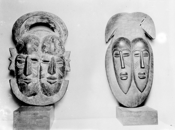 Two double faced masks, African [?]