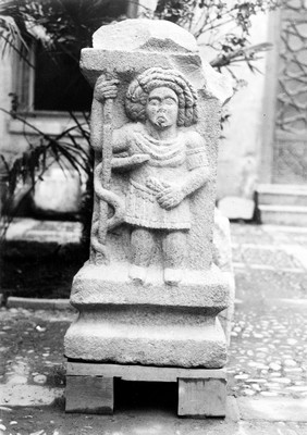 Statue of Aesculapius in courtyard of Cairo museum