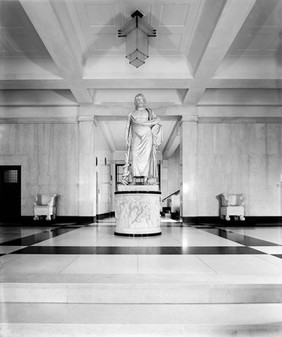 Wellcome Research Institute; close up of Aesculapus statue.