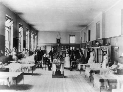 Baron Lister (seated) with his staff, Victoria ward, King's College Hospital, Lincoln's Inn Fields. Photograph, 1893.