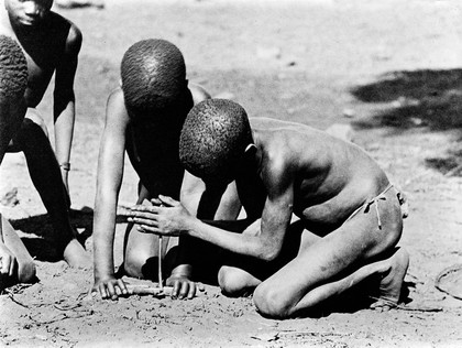 Making fire by friction, Badepi Sebukunilang, Africa