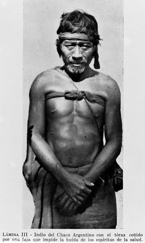 M0005852: Chaco doctor wearing a sash across his chest to prevent the escape of the spirits of health