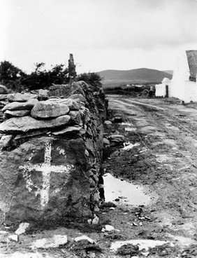 Fairy Charm, sign on a wall. Milton. co. Kerry