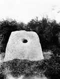 view Holed Stone, Clock-A-Torill. Tullon. Co. Carlon. Clothes are passed through the Apertures for cures.