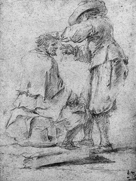 M0006893: A surgeon treating a seated patient