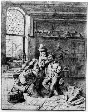 M0006897: A dentist treating a patient with two men sat on the floor next to him