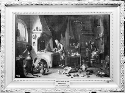 An alchemist in his laboratory. Oil painting by a follower of David Teniers the younger.