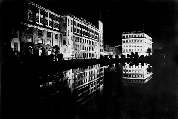 Burroughs Wellcome & Co factory, Dartford. Floodlit. Oblique view (1931).