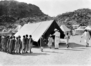 view Boys receiving their wages camp at Jebel Moya, Sudan.