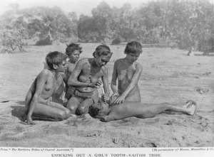 view Knocking out a girl's tooth, Kaitish people, Australia.