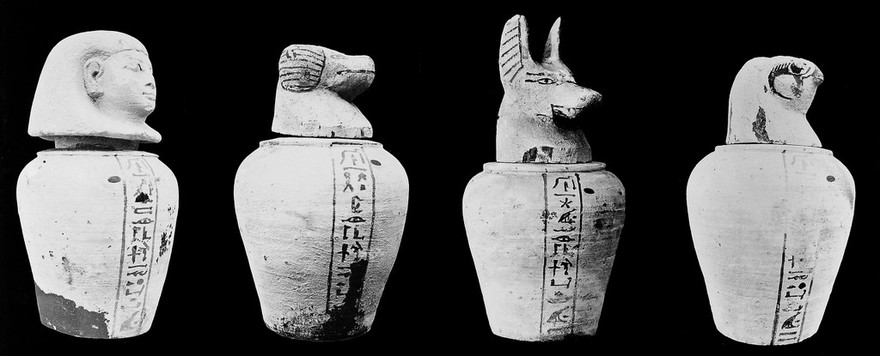 Egyptian terracotta sepulchial vases in shapes, 1 Genius Amset, 2 Genius Hapi, 3 Genius Tuantmutf, 4 Genius Kalhsenuf, XXVI Dynasty.