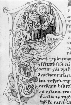 Illuminated "P": man using pestle and mortar, 13th Century.