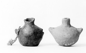 view Small pottery vessels for holding curare. S. America.