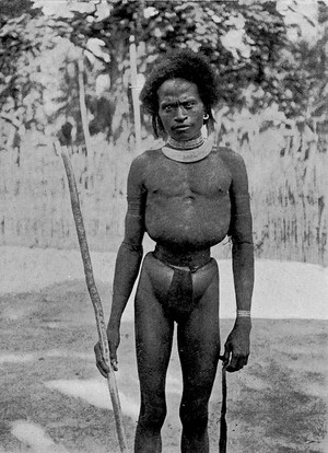 view 'Tight-lacing' in New Guinea. A boy of the Mekeo district who has passed through initiation ceremonies and is of an age to marry.