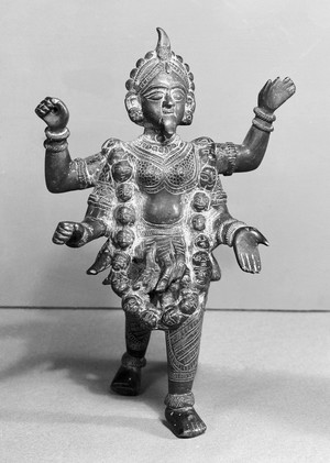 view Devi, the wife of the Hindu God Siva. Goddess has two forms, one mild and the other fierce. Here she is depicted in the form of fierce, when she is known as Durga or Kali.