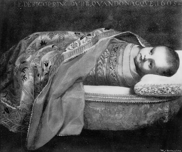 M0013507: Child in swaddling clothes
