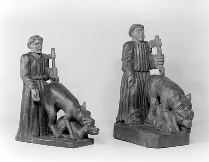 Saint Tugean, with a key and wolf biting dog.