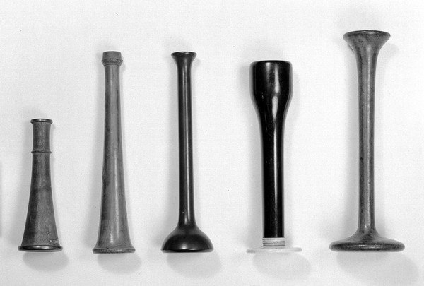 4 Stethoscopes. A- small, funnel-shaped, lined with brass. B- obatined from Italy. C- obtained from Italy. D- bell shaped, probably 1850s to 1860s. E- probably Stoke's type.