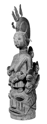 M0014367: Yoruba head mask surmounted by a female figure and several child figures, Southern Nigeria