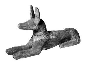 view Egyptology, Wooden figure of a jackal.