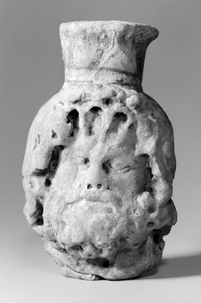 Head of Serapis with 'modius'.