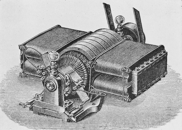 An early type of Siemens' Self Exciting dynamo (1873) with drum-wound armature and bar commutator.