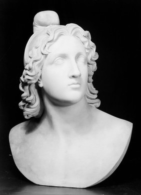 Bust in white marble of Mithras.