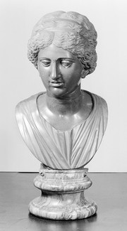 Bust of a young woman in grey, black, red marble. Partly ancient work skilfully restored.