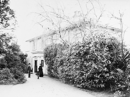 M0015787: Portrait of Timothy Richards Lewis (1841-1886) with his wife and daughter at "Bywood", Southampton