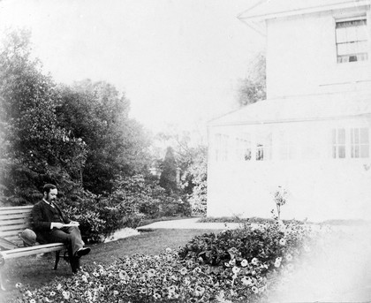 Portrait of T.R. Lewis in his garden at 'Bywood'. From a snapshot lent to the Museum by Col. Lewis (and returned).